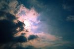 Sun Behind Clouds Background Stock Photo