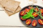 Baked Cherry Tomatoes With Basil And Thyme Stock Photo