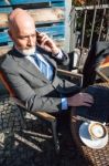 Bearded Businessman With Working Outside The Office Stock Photo