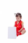 Little Asian Girl (thai) In Traditional Chinese Cheongsam Stock Photo