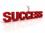 Figure Standing On Success word Stock Photo