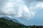 The Beauty Of The Sky When Light Hits The Clouds And Mountain Stock Photo