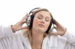 Woman Listening To Music With Closed Eyes Stock Photo