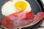 Egg Sunny Side Up With Italian Speck Ham Stock Photo