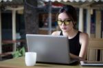 Portrait Of Thai Adult Student University Beautiful Girl Using Her Laptop Stock Photo