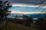 View Over Lake Of Zurich Into Snowy Mountains Stock Photo