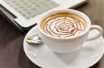 Cappuccino Coffee On The Table Stock Photo