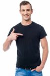 Handsome Casual Man Pointing Stock Photo