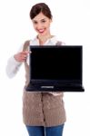 Woman Showing Laptop Stock Photo