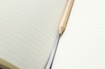 Pencil And Blank Opened Notebook Stock Photo