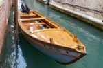 Motorboat Moored In A Canal In Venice Stock Photo