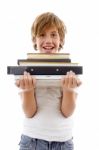 Front View Of Boy Holding Books Stock Photo