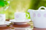 White Porcelain Set For Tea Or Coffee On Wooden Table Stock Photo