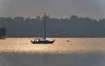 Beautiful Image Of A Lake And Boat On Sunset Stock Photo