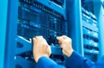 Man Fix Server Network In Data Center Room Stock Photo