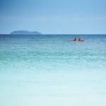 friends paddling kayak Stock Photo