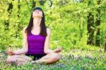 Yoga Relaxation In Forest Stock Photo