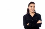 Beautiful Woman Posing With Arms Crossed Stock Photo