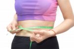 Woman In Sport Bra Measuring Her Body With Tape Isolated On Whit Stock Photo