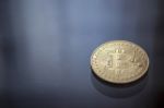 Bitcoin Curency Dof On Blue Light Background Stock Photo