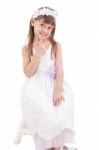 A Portrait Of A Cheerful Little Girl On The White Background Stock Photo