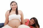 Beautiful Pregnant Woman With Her Daughter Stock Photo