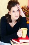 Worried Student And Bunch Of Books At Home Stock Photo