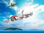 Young Man Flying From Passenger Plane To Natural Destination Isl Stock Photo