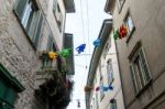 Flying Fish Across A Street In Citta Alta Bergamo Stock Photo