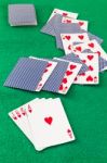 Poker  Cards On Green Baize Casino Stock Photo