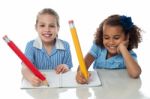 We Are Using Giant Pencils ! Stock Photo