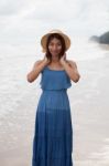 Portrait Of Smiling Face Of Young Asian Tan Skin Woman With Long Stock Photo