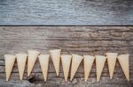 Flat Lay Ice Cream Cones Collection On Shabby Wooden Background Stock Photo