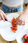 Beautiful Young Woman Preparing Breakfast At Home Stock Photo