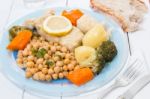 Codfish With Chickpeas And Vegetables Stock Photo