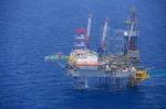 Helicopter Pick Up Passenger On The Offshore Oil Rig Stock Photo