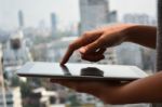 Touching Screen Of A Tablet Computer Stock Photo