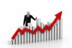 Business Man With A Growth Graph Stock Photo