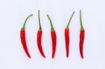 Red Chili Pepper On A White Background Stock Photo