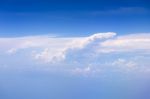 Big White Cloud And Blue Sky Background,view From Airplane Stock Photo