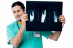 Disappointed Surgeon After Seeing X-ray Report Stock Photo