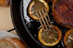 Pork Chop Seared On Iron Skillet Stock Photo