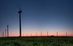 Night Under Wind Turbine Stock Photo