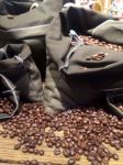 Coffee Beans On Bags Stock Photo