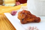 Single Fried Chicken Sweet Dipped On White Plate Stock Photo