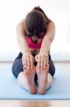 Beautiful Healthy Young Woman Doing Exercise At Home Stock Photo