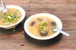 Pork And Mushroom Congee On Morning Table Stock Photo