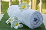 White Towel With Flower Stock Photo