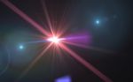 Lens Flare Or Star Flare In Black Background.modern Nature Flare Effect With Black Background For Overlay Design Stock Photo