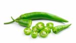 Green Hot Chili Pepper On White Stock Photo